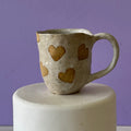 buff hearts mug