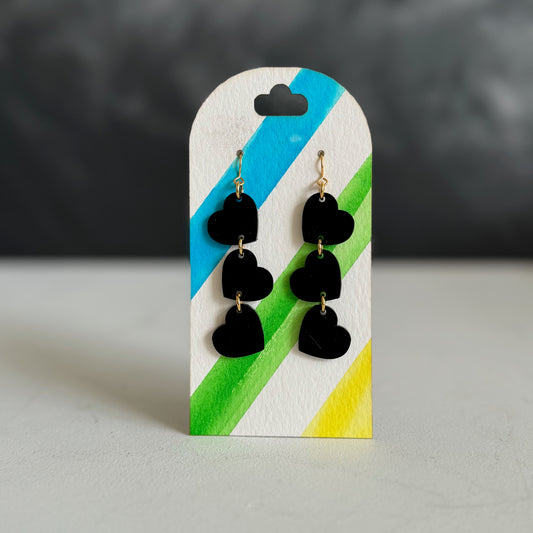 wiggly black heart earrings