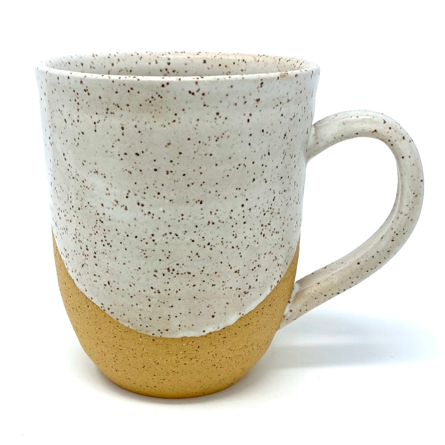 mug as seen from the back. the white glaze nearly covers the back.